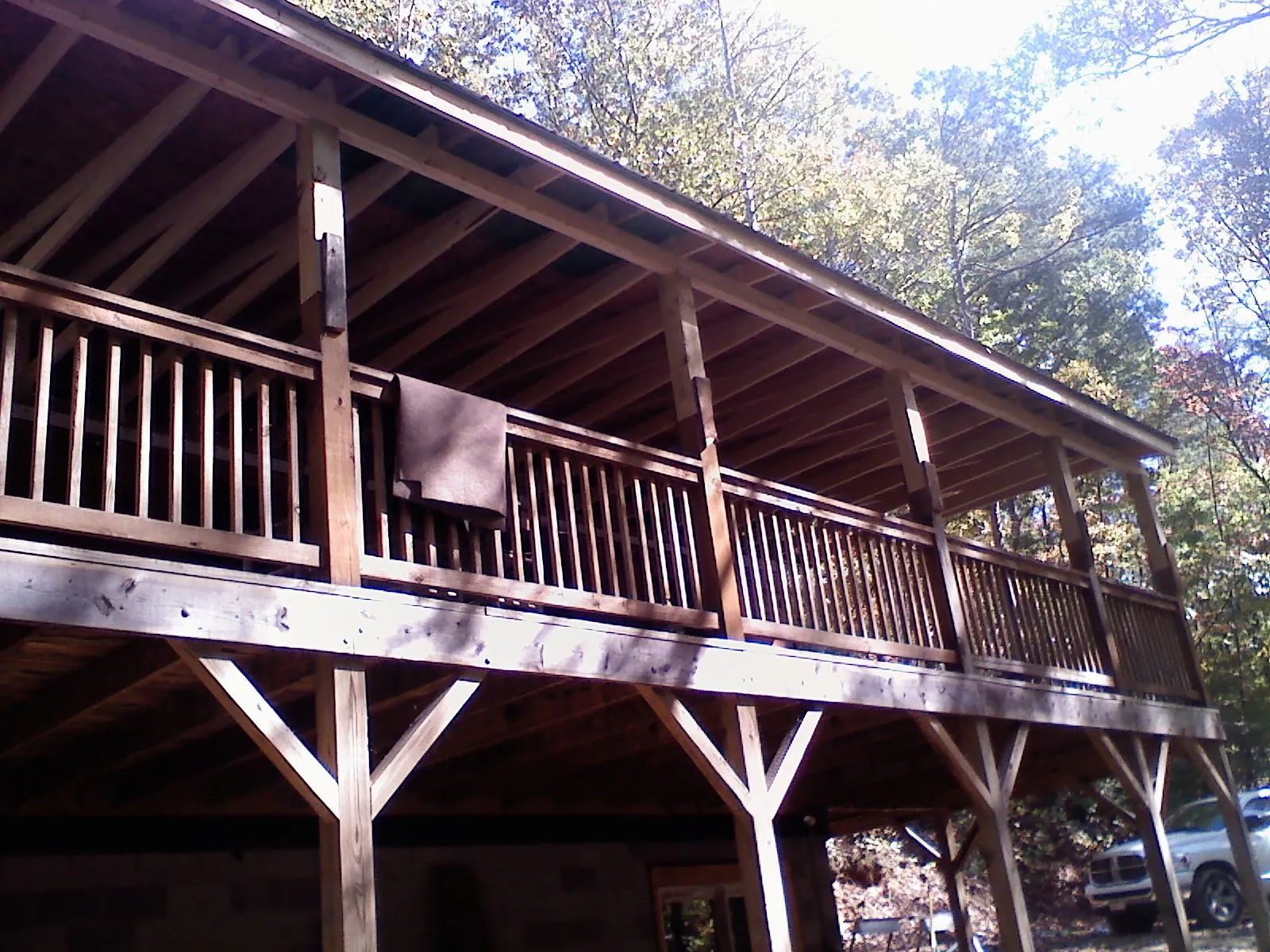 Timber framing under a new elevated porch and deck — Roof Leak Repair in Perrysburg by Roofing Brothers